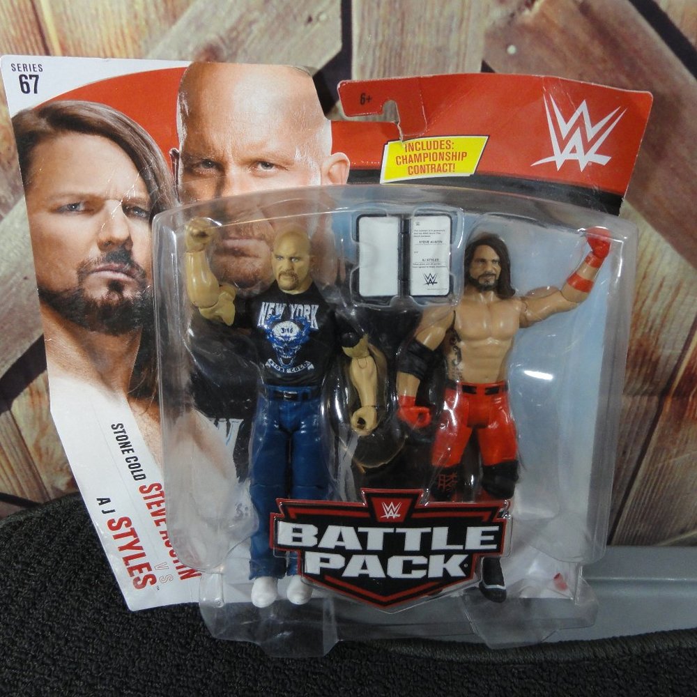 Steve Austin & Aj Styles Battle Pack W contract~NIP~Sealed~Action fi…